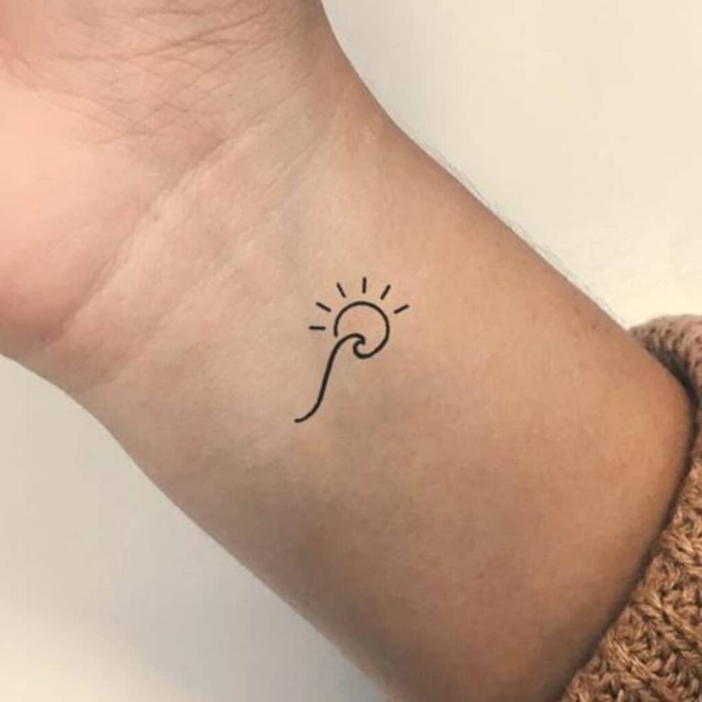 Unique Wrist Accents: Classy Sun and Wave Tattoos for Women