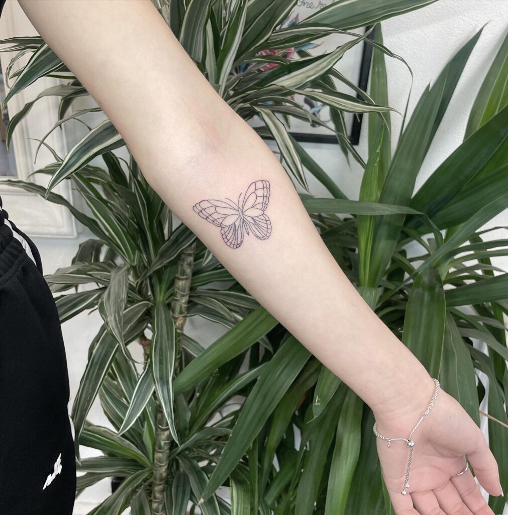 Uniquely Detailed Fineline Butterfly Tattoo on the Forearm: Butterfly Whispers