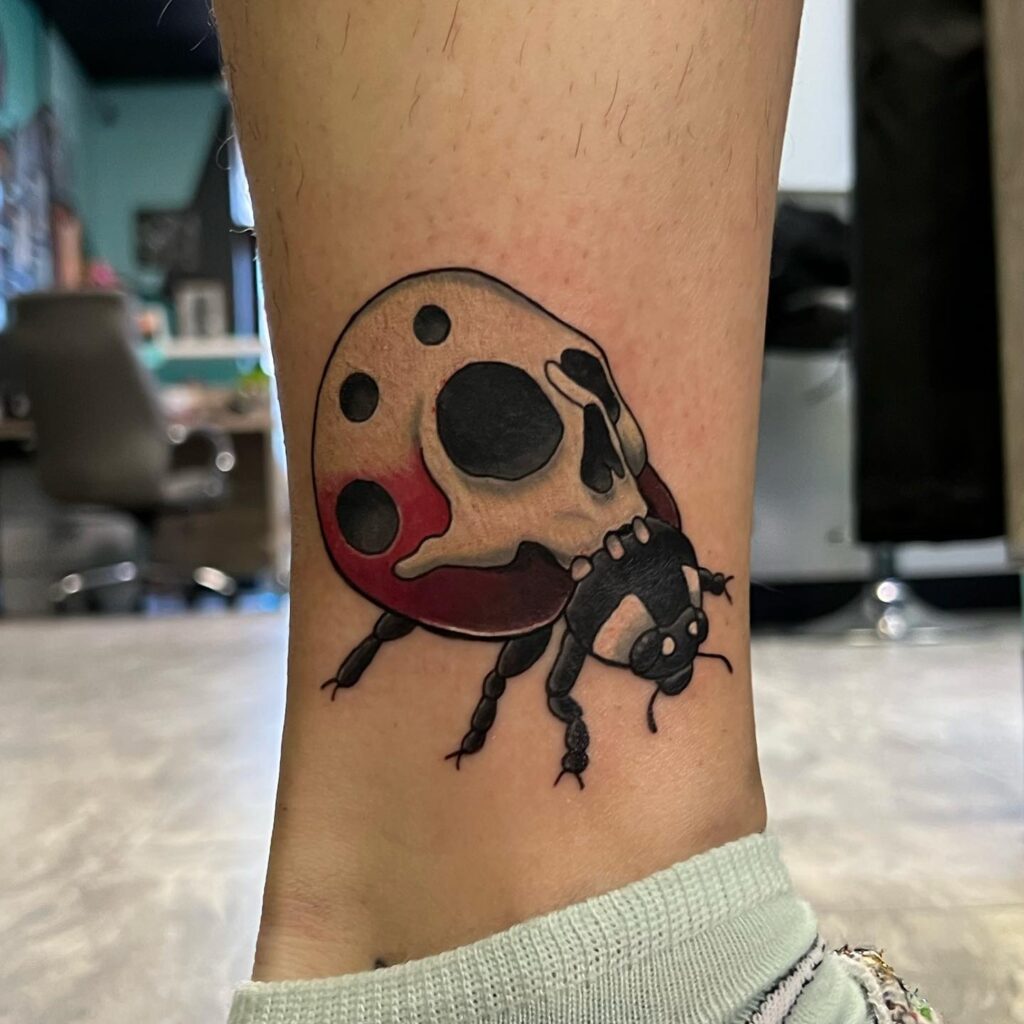 Unisex Lady Bug Tattoo Ideas For Leg With Skull