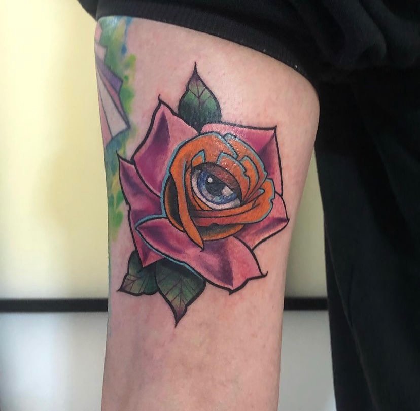 Utmost Realistic Big Eyeball Tattoo Design With Rose On Hand