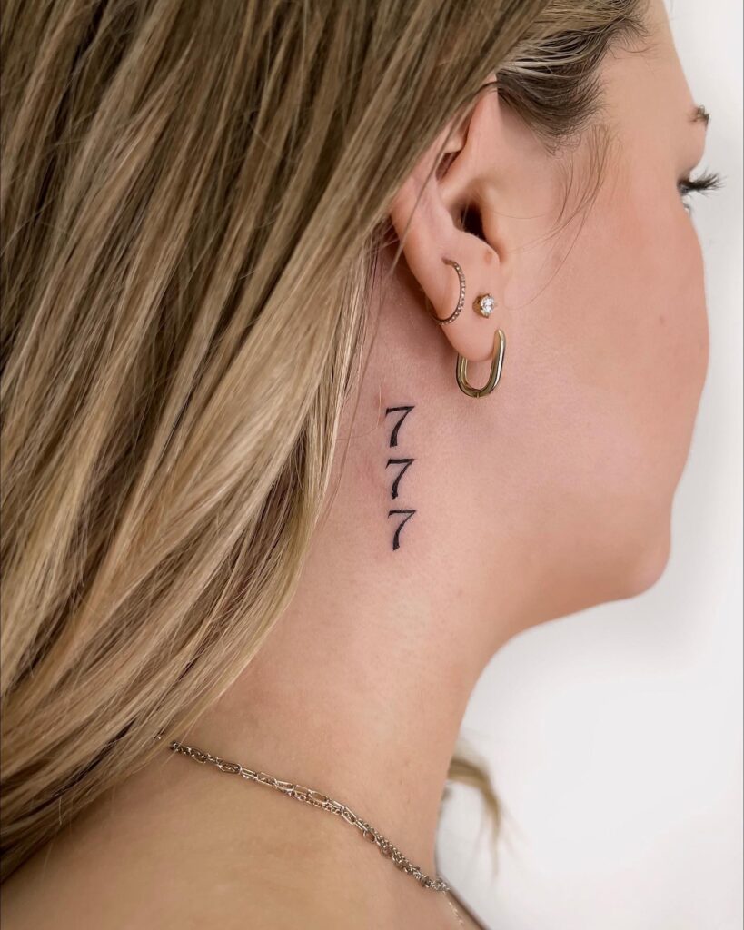 Vertical number tattoo on the side neck, women's black ink elegance