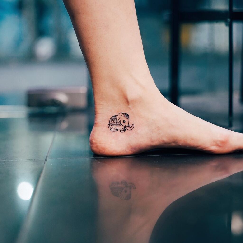 Very Tiny Baby Elephant Tattoo Below the Ankle with Inside Mandala Custom Design: Tiny Mandala Totem