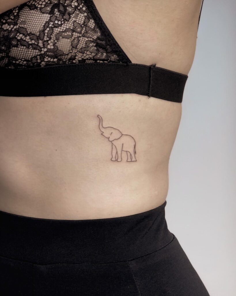 Very tiny outline elephant tattoo with trunk up: gentle giant