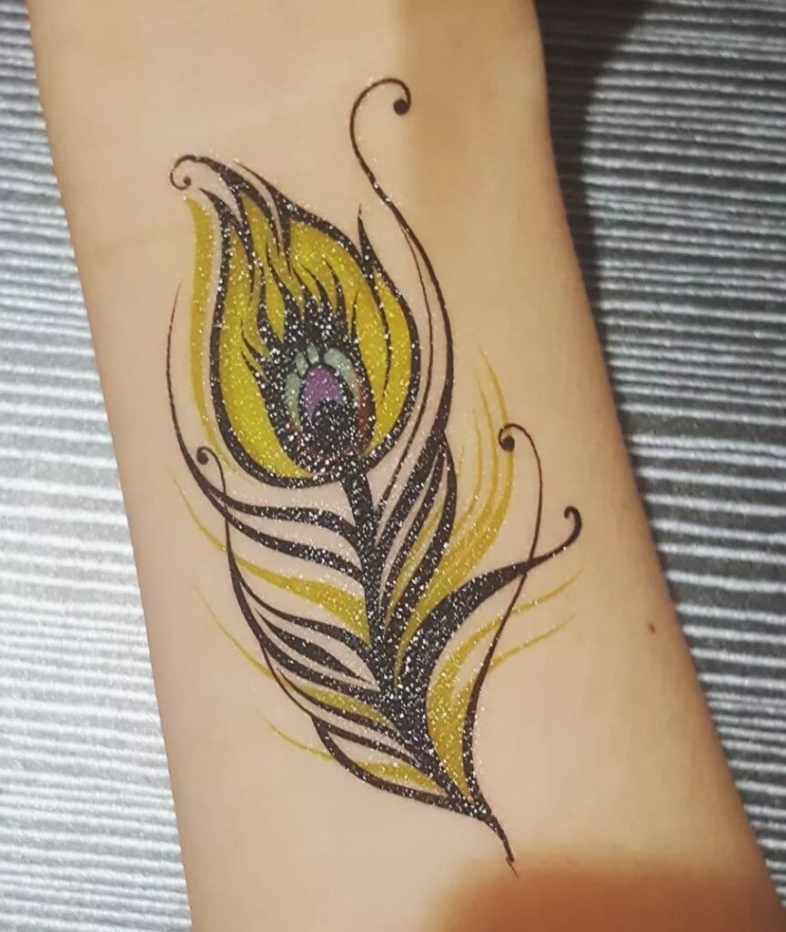 Water based Peacock Feather Tattoo Designs for Ladies