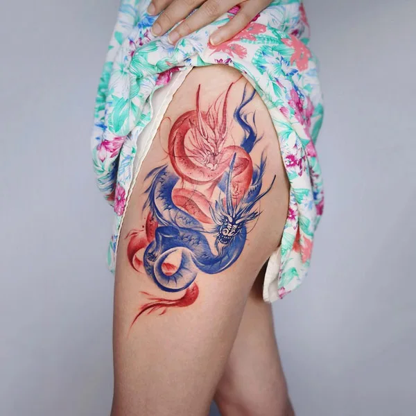 Watercolor Dragon tattoo on thigh