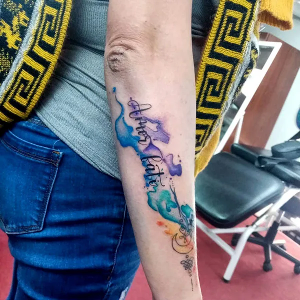 Watercolor amor fati tattoo