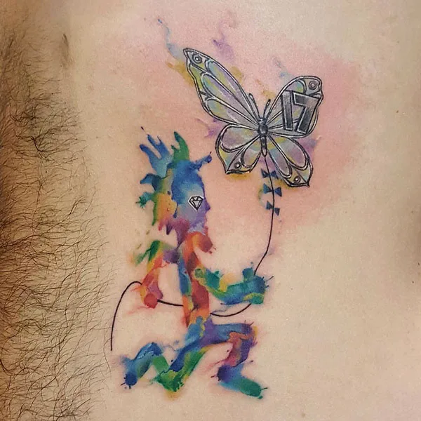 Watercolor hatchet man tattoo