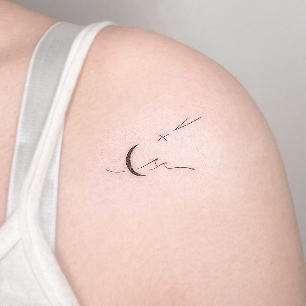 Wave of whimsy fine line moon and star shoulder tattoo for girls