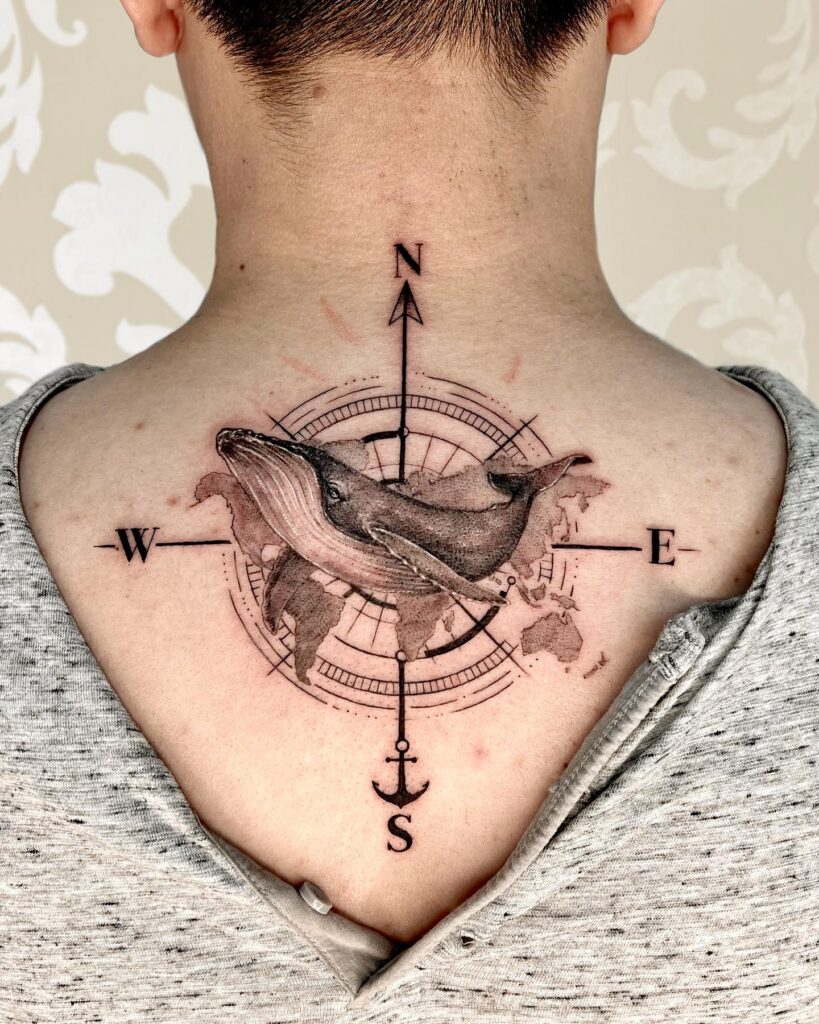 Whale and Compass Tattoo on the Back of the Neck for a Seafaring Vibe: Nautical Whimsy