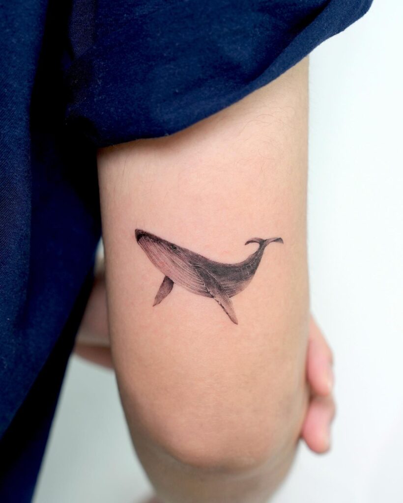 Whale Side View Tattoo on the Back of the Above the Elbow: Majestic Oceans