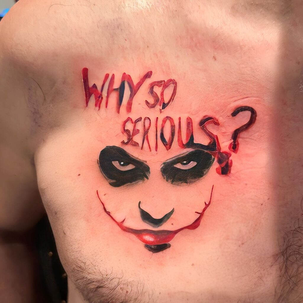 "Why So Serious" Joker-Face Tattoo Designs in Red Color Text on Chest