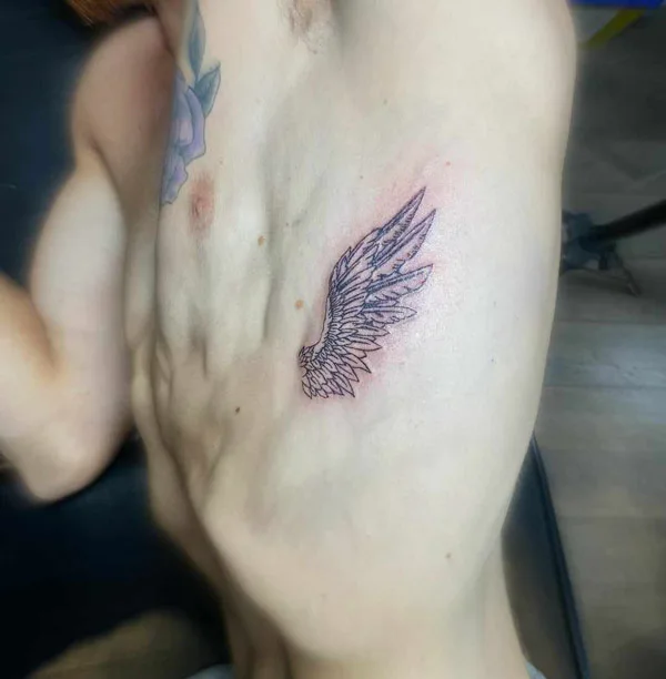 Wing Rib Tattoo