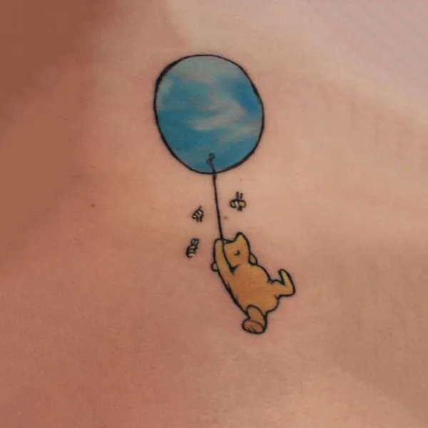 Winnie the pooh bee tattoo