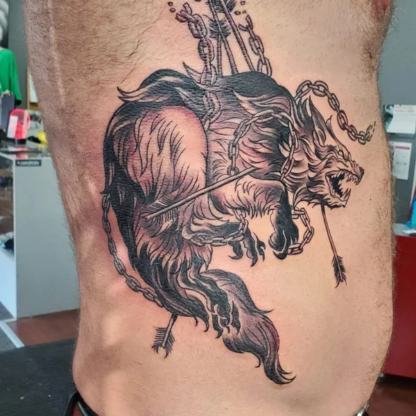 Wolf Rib Tattoo