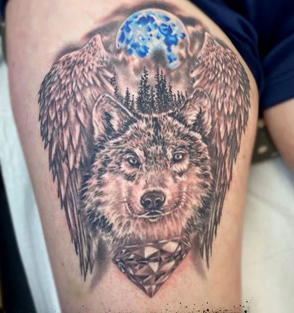 Wolf with angel wings tattoo
