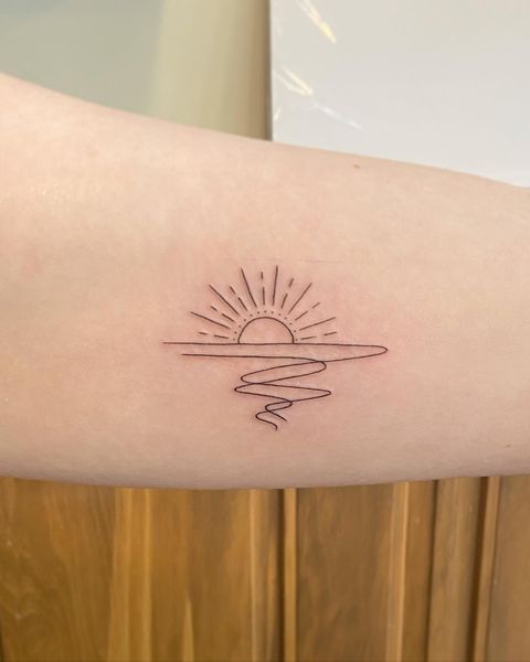 Wonderful Wave And Sun Line Tattoo For Arm