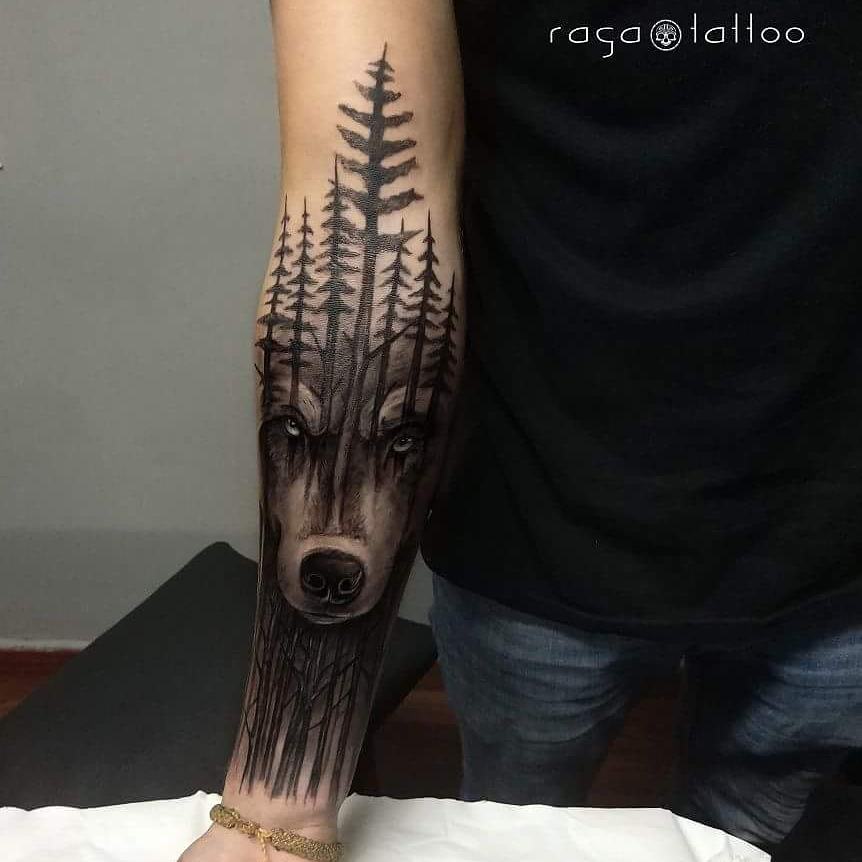 Woods and wolf tattoo forearm for men nature's symbiosis