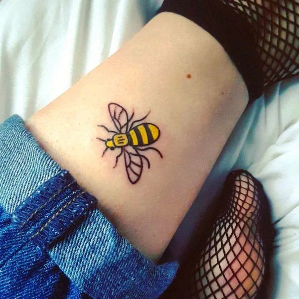 Yellow bee tattoo