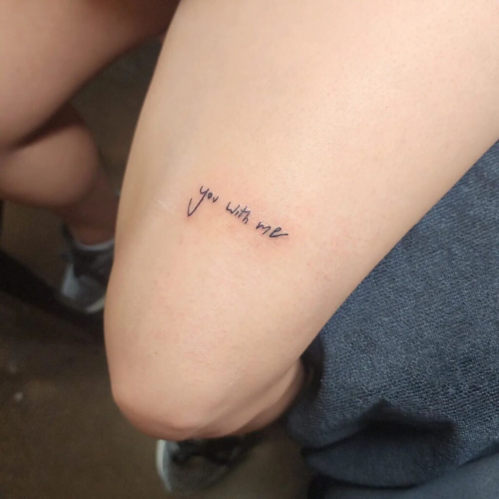 "You with Me" Tattoo Above the Knee: Expressive Ink for Girls