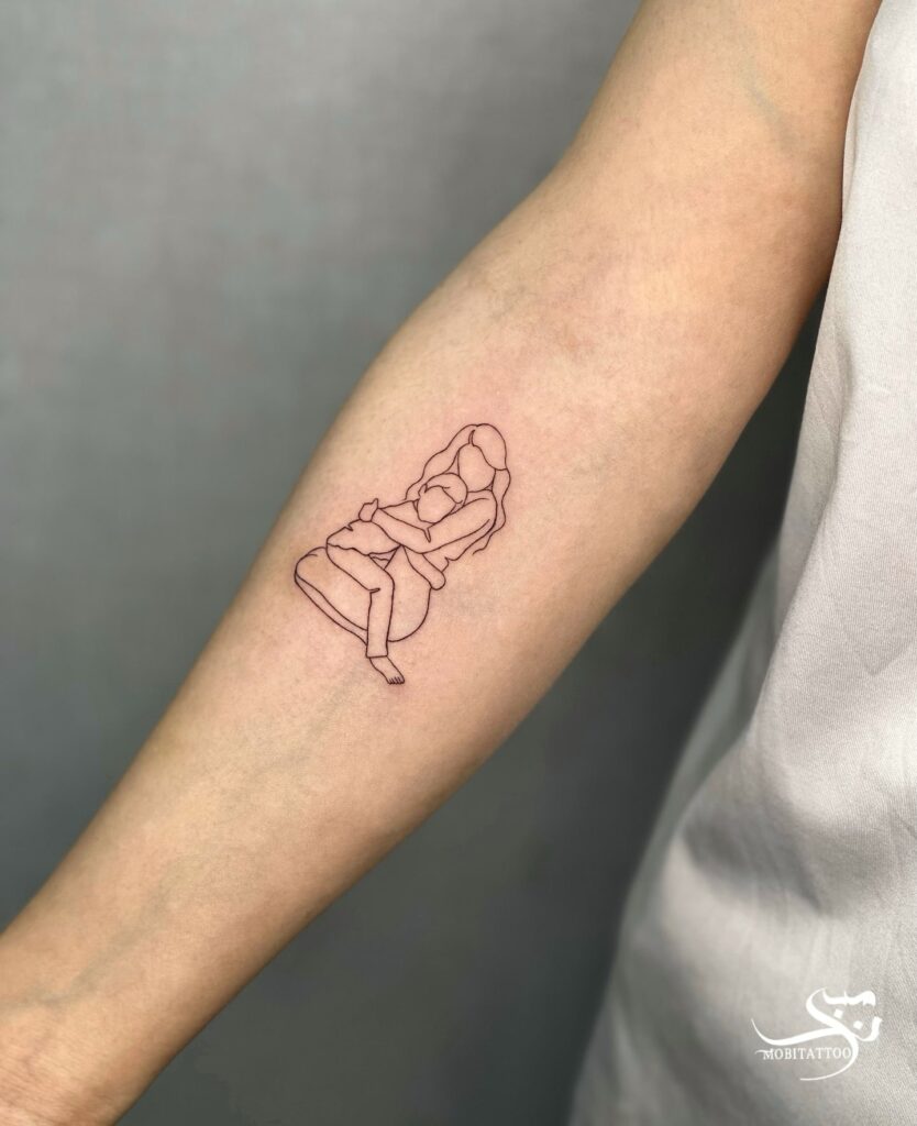 Young Mom and Son Affectionate Hug Outline Tattoo on the Forearm: Tender Embrace