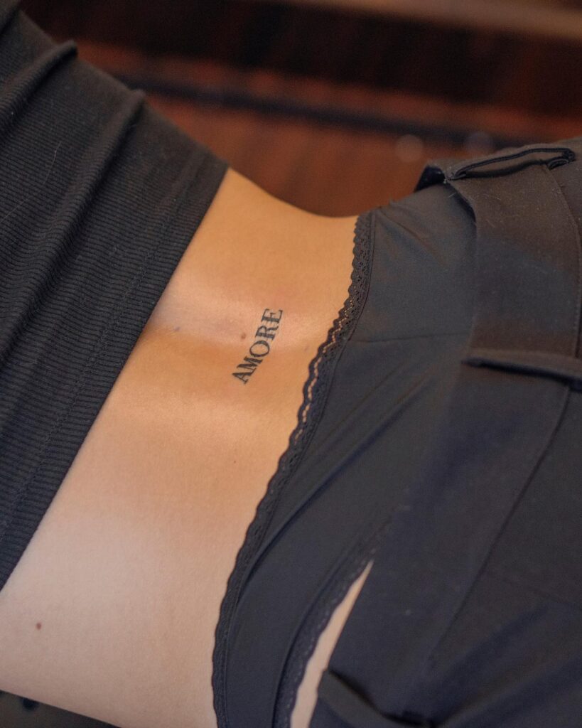 'amore' Text Lettering Tattoo Lower Back Tattoo: Romantic Flourish