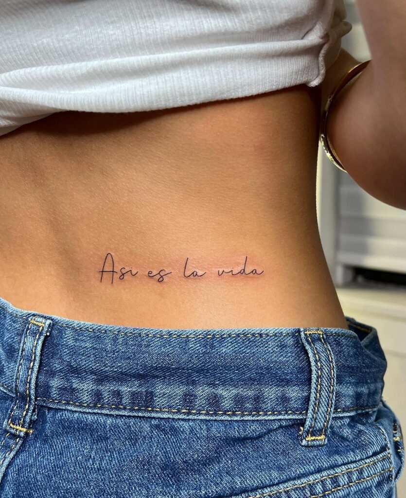 'Asi es la Vida' Handwriting Lower Back Tattoo for Women: Spanish Whispers