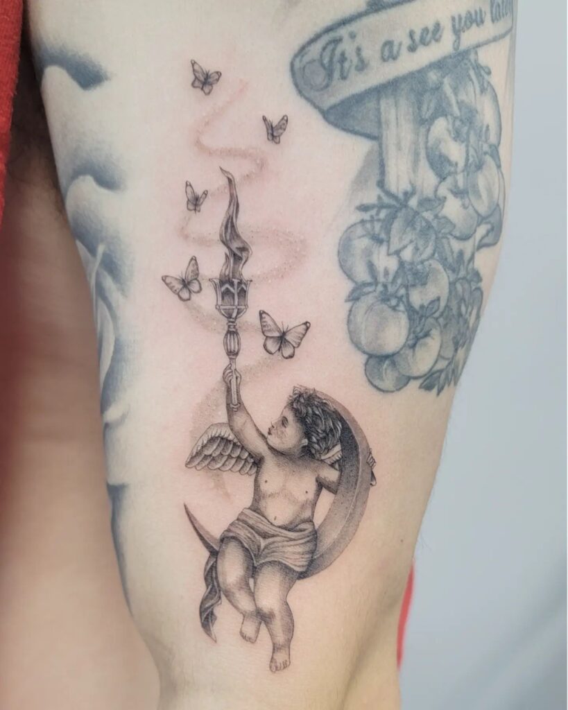 Baby Angel on Moon With Flame Tattoo Design
