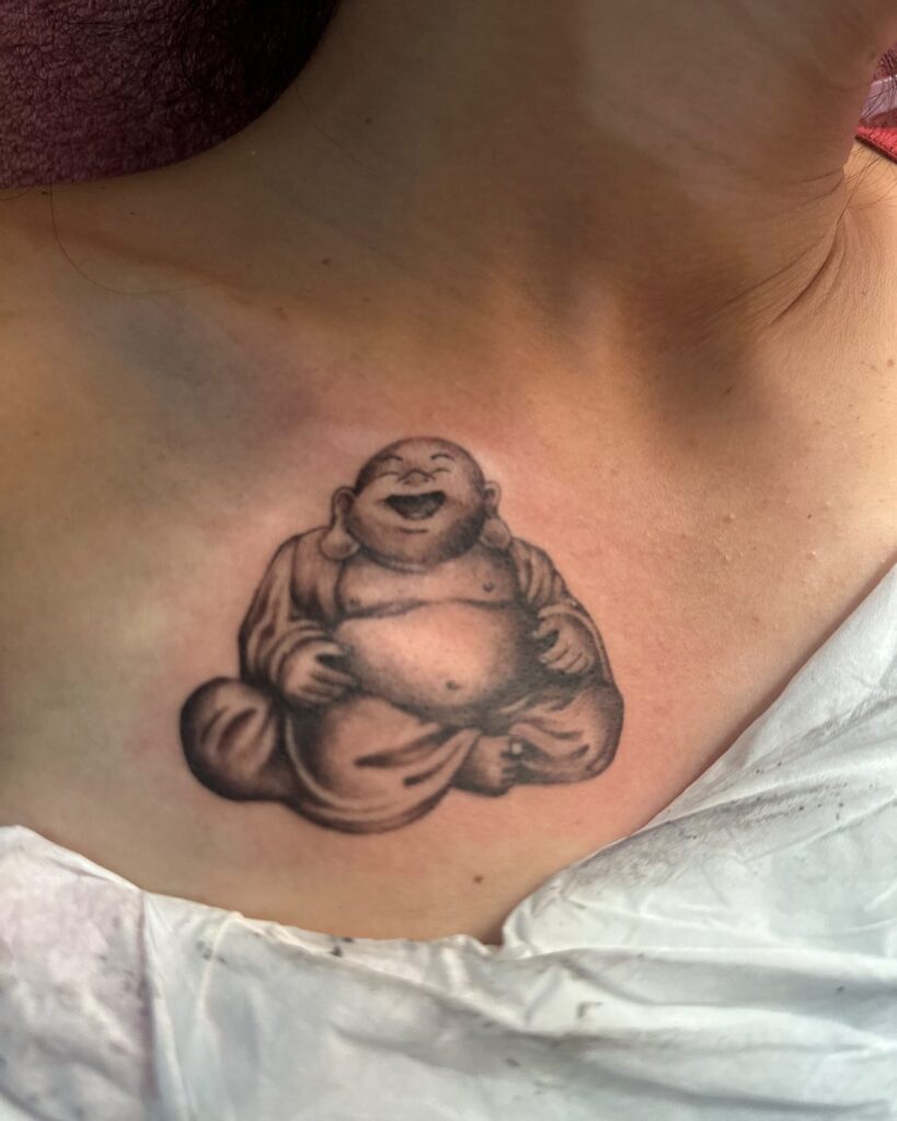 classy laughing buddha below female neck tattoo spiritual grace 
