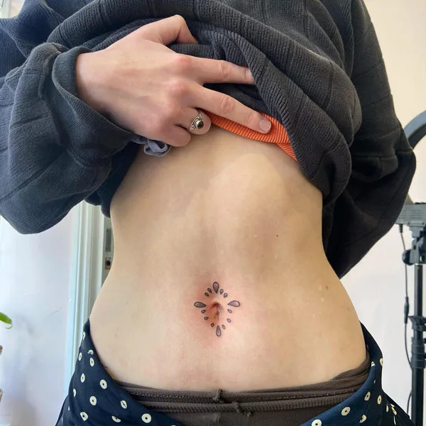 cute belly button tattoo