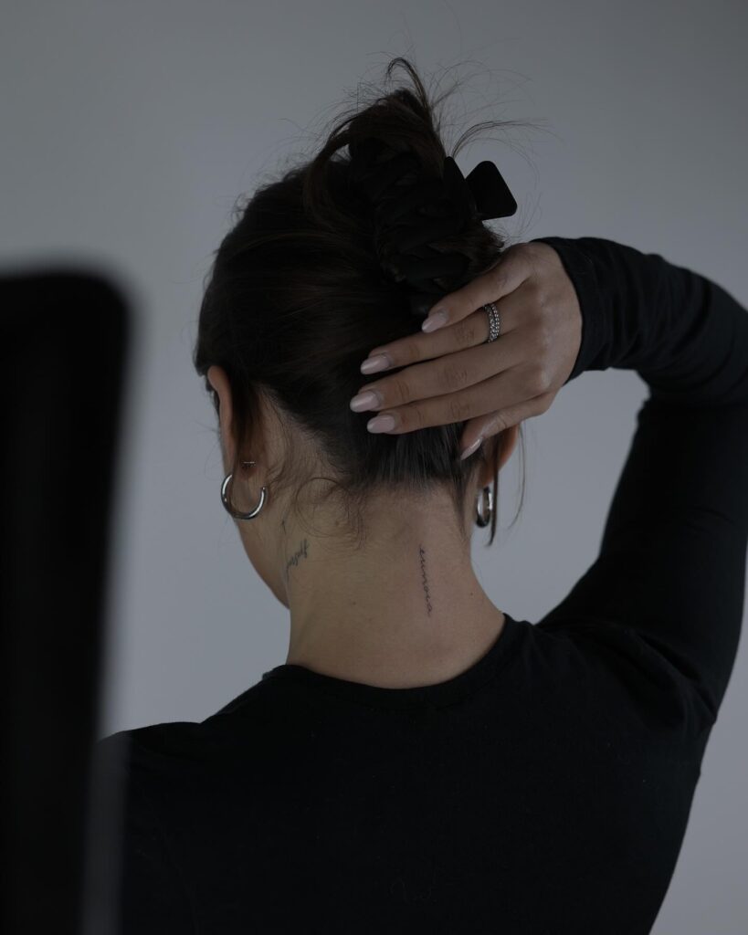 'Eunoia' Vertically Aligned Handwriting on the Back of the Neck, a Micro Tattoo: Beautiful Mind