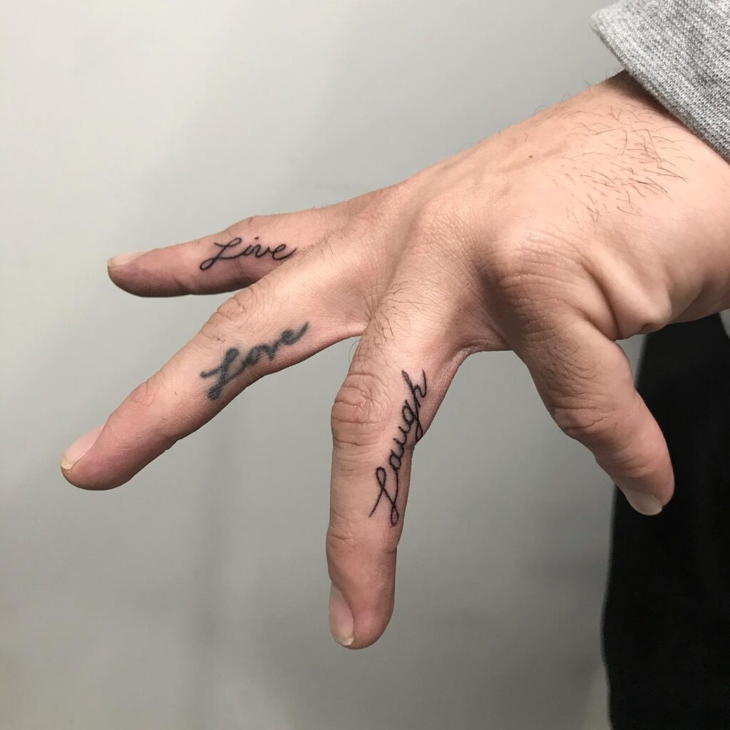 Expressive Finger Tattoos Love, Live, Laugh Meaningful Adornments