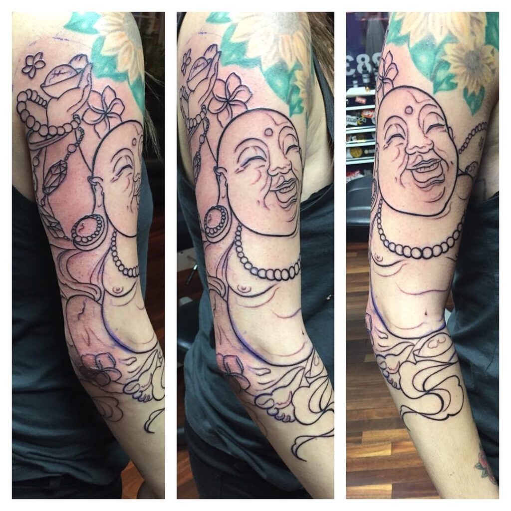 full sleeve smiling buddha tattoo for girls whimsical artistry
