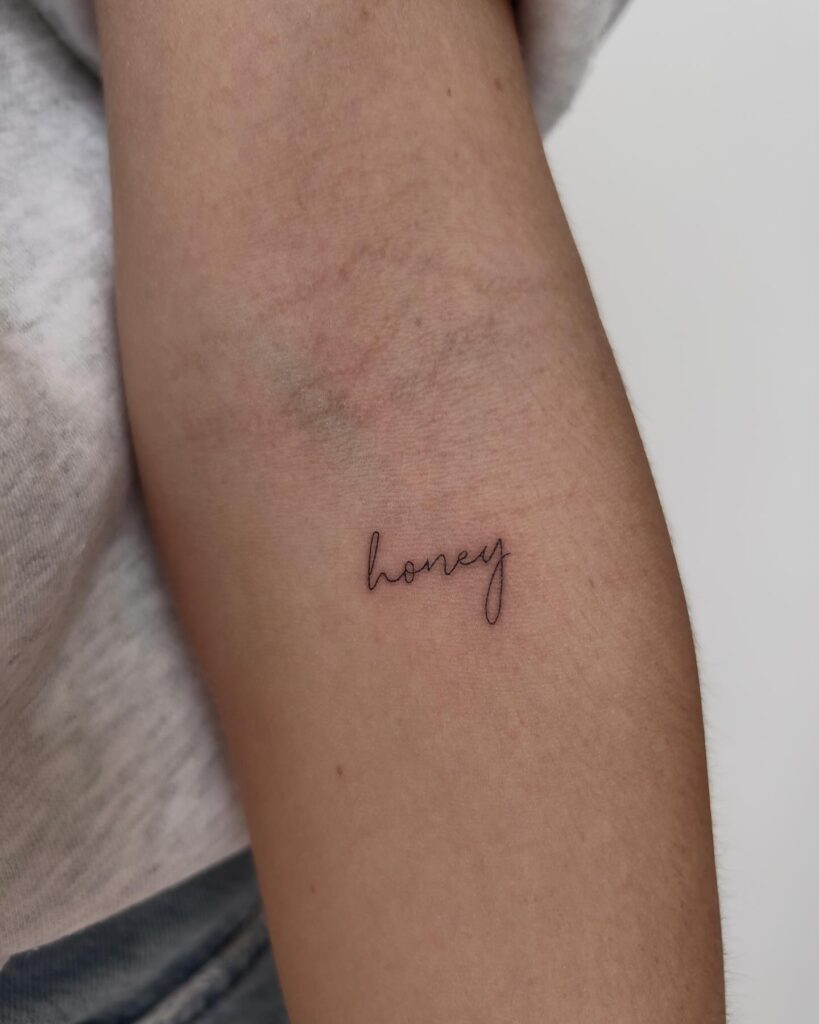 'Honey' Script Text Lettering Tattoo Below the Elbow: Sweet Affection
