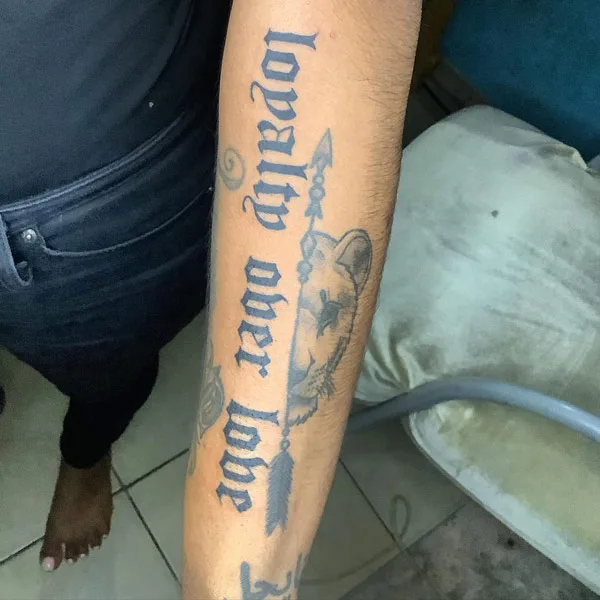 loyalty over love tattoo 14