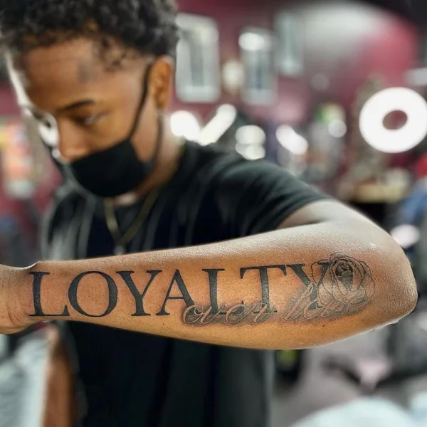 loyalty over love tattoo 16