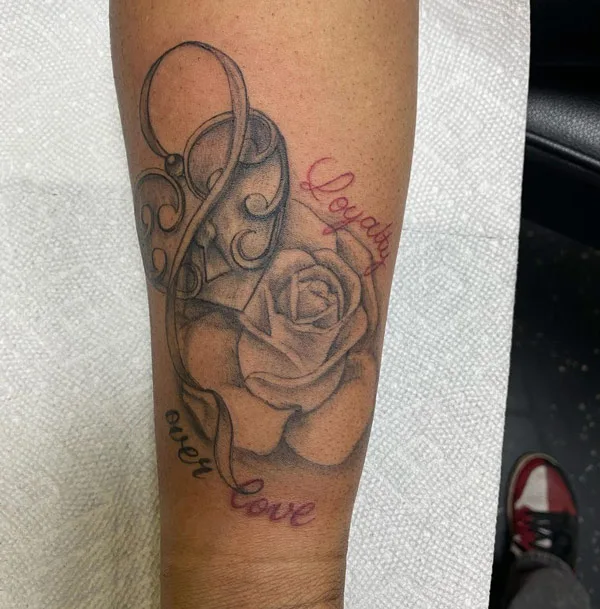 loyalty over love tattoo 22