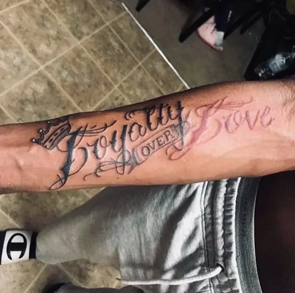 loyalty over love tattoo 24