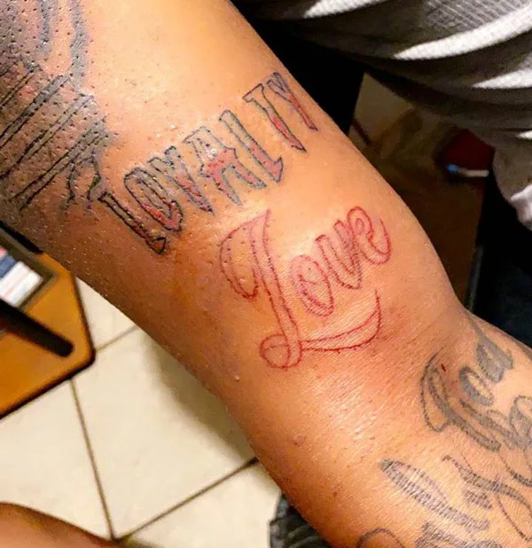 loyalty over love tattoo 33