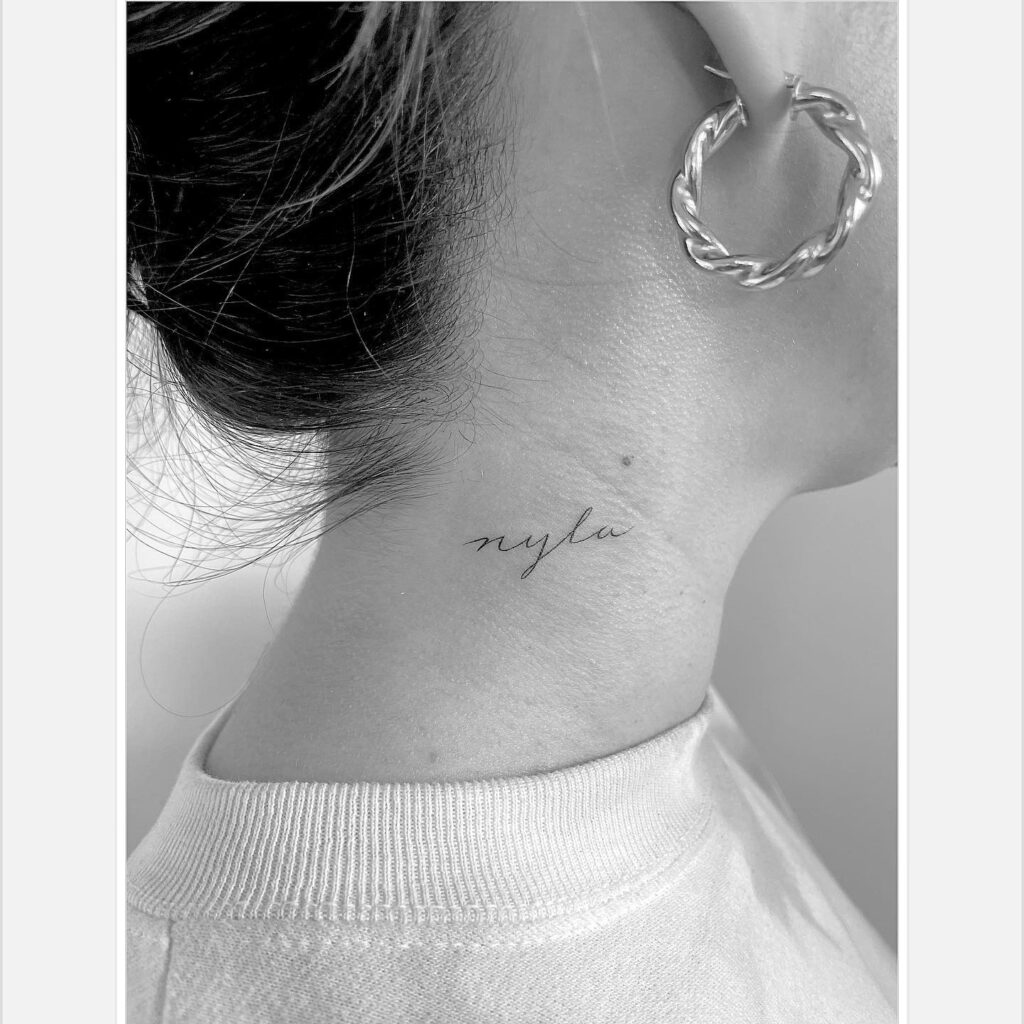 'nyla' Fineline Text Lettering on the Side of the Neck: Chic Minimalism