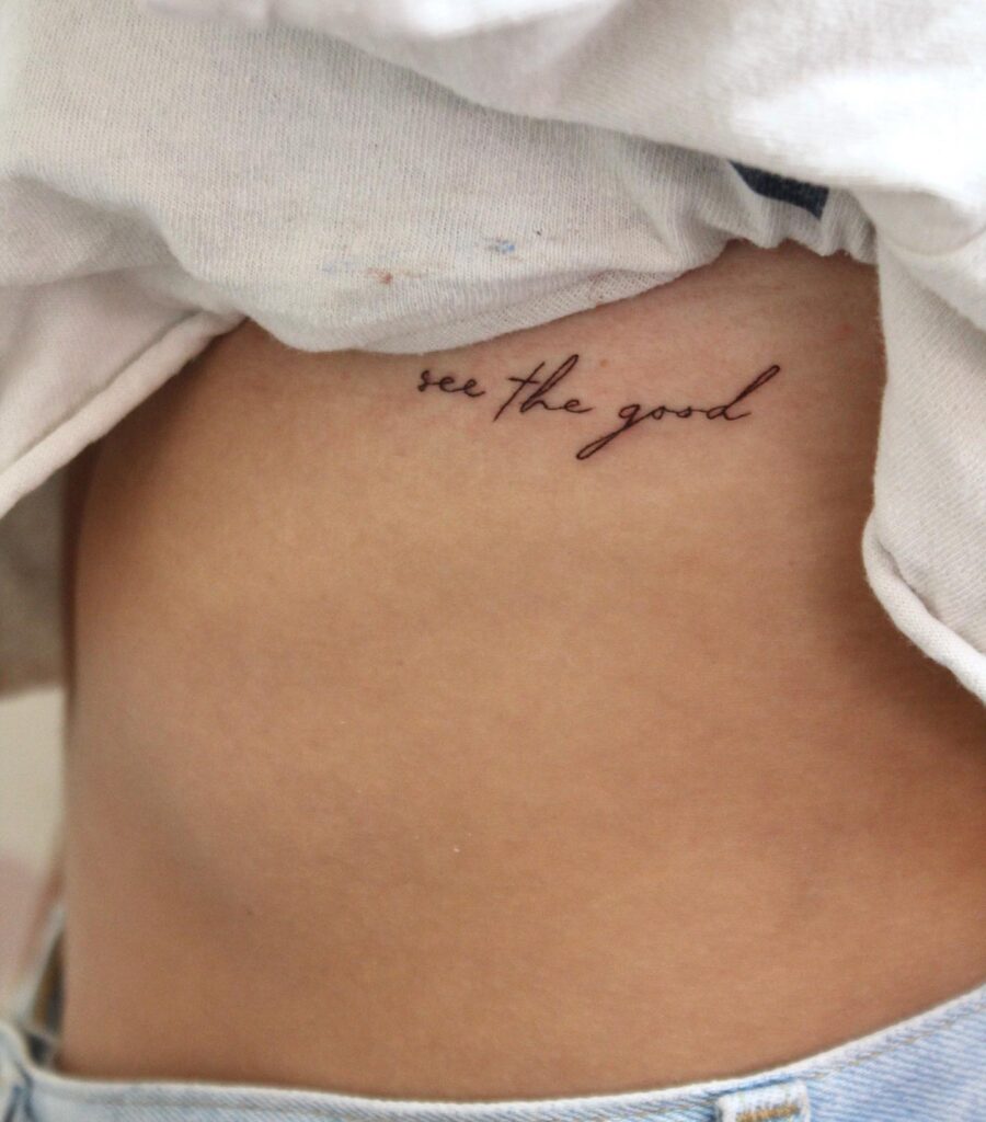'see the good' gorgeous side rib script lettering tattoo: optimistic verse
