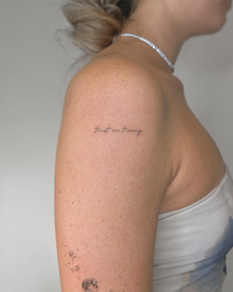 'Trust in Timing' Fineline Upper Arm Tattoo with Grace: Timeless Trust