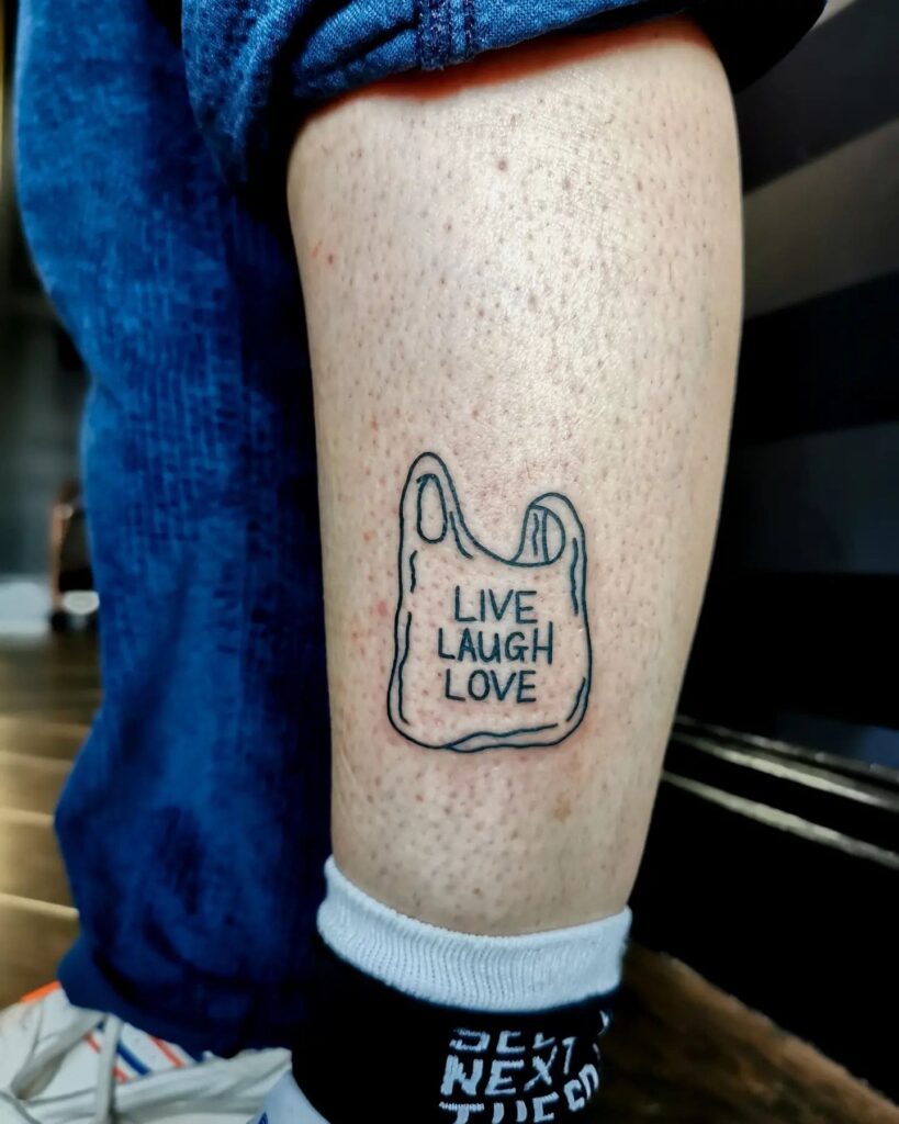 Unique Lower Leg Tattoo Plastic Bag Over Live Laugh Love Text