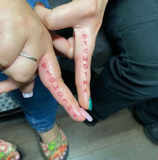 yhlqmdlg finger tattoo