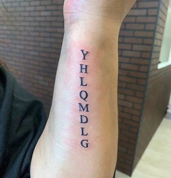 yhlqmdlg forearm tattoo
