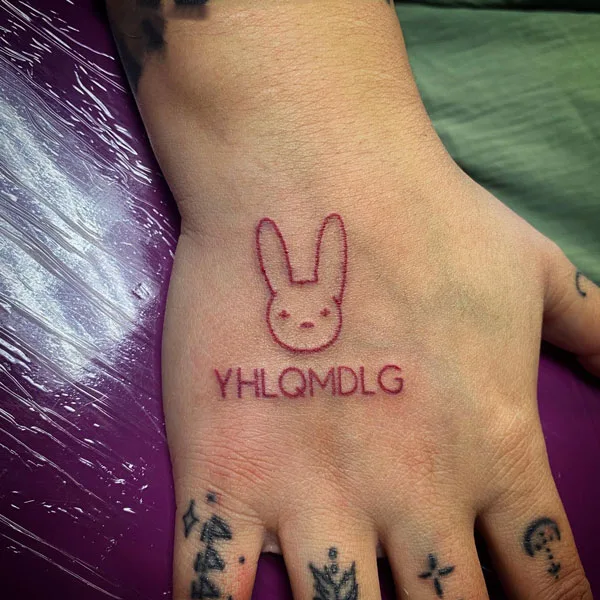 yhlqmdlg hand tattoo