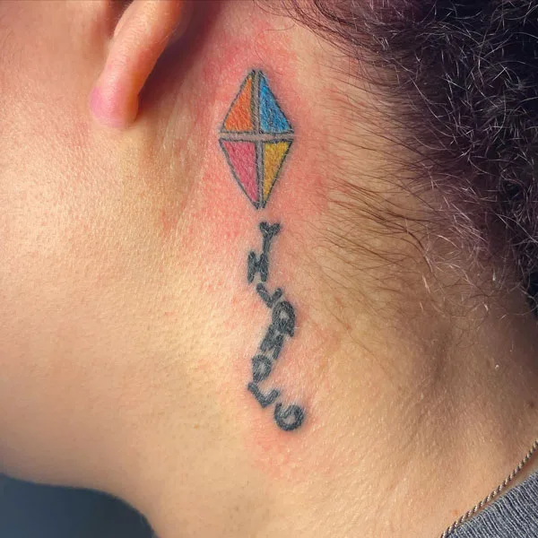 yhlqmdlg tattoo behind the ear